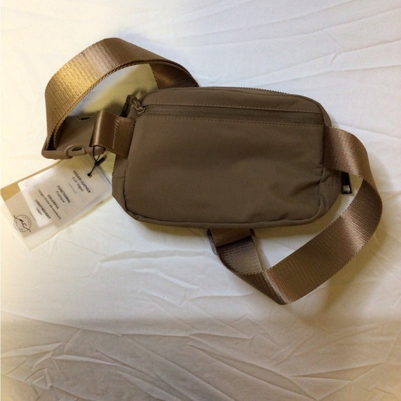 Tan Crossbody Bag with Adjustable Strap and Durable Fabric - Picture 3 of 9
